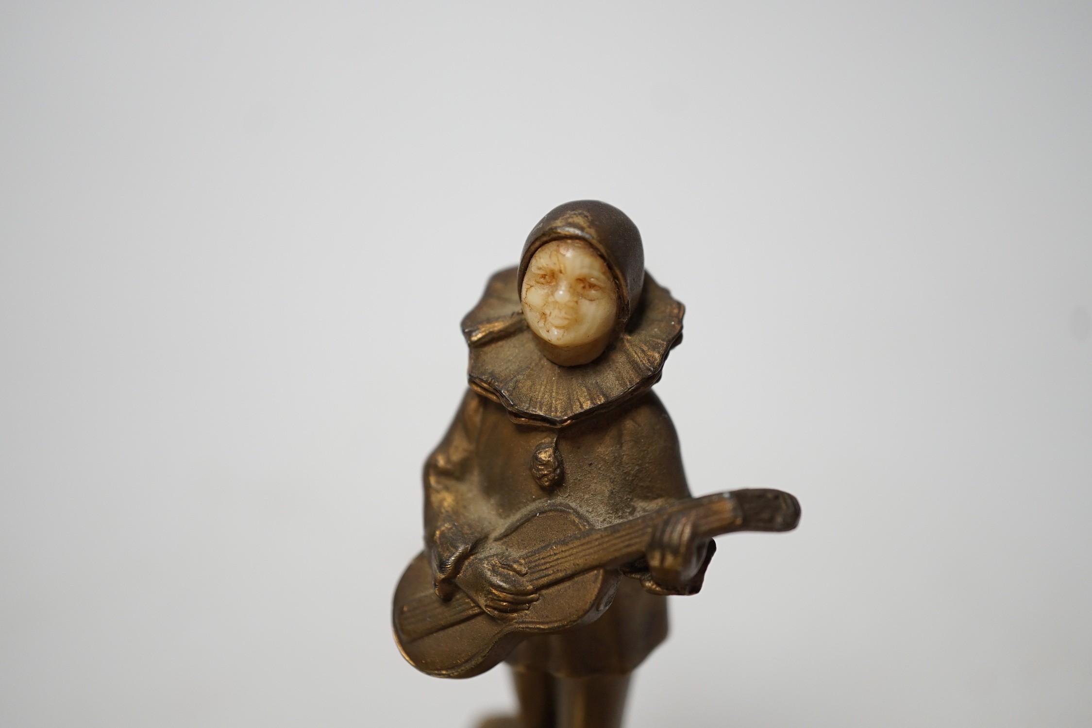 An Art Deco violin player bell with ivory face inset 9.5cm